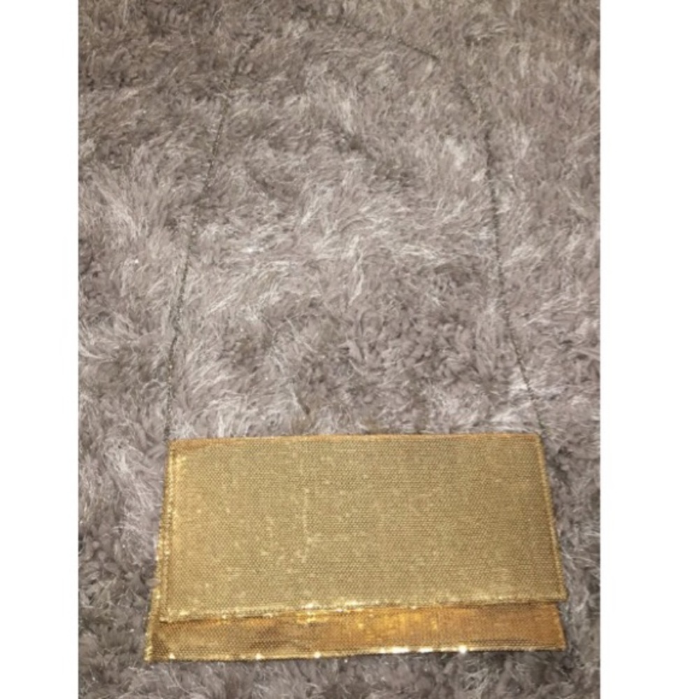 Gold sequined clutch